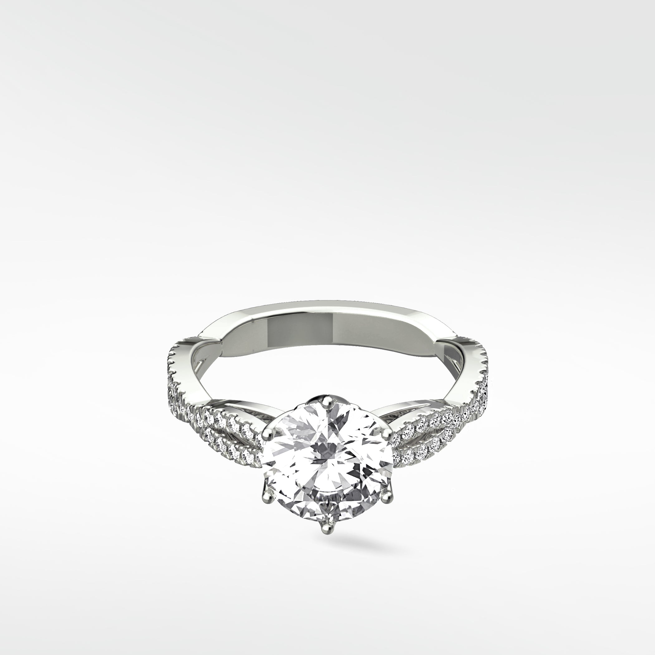 The Zamifolia platinum engagement ring with a round brilliant diamond and a pavé-set split shank band.