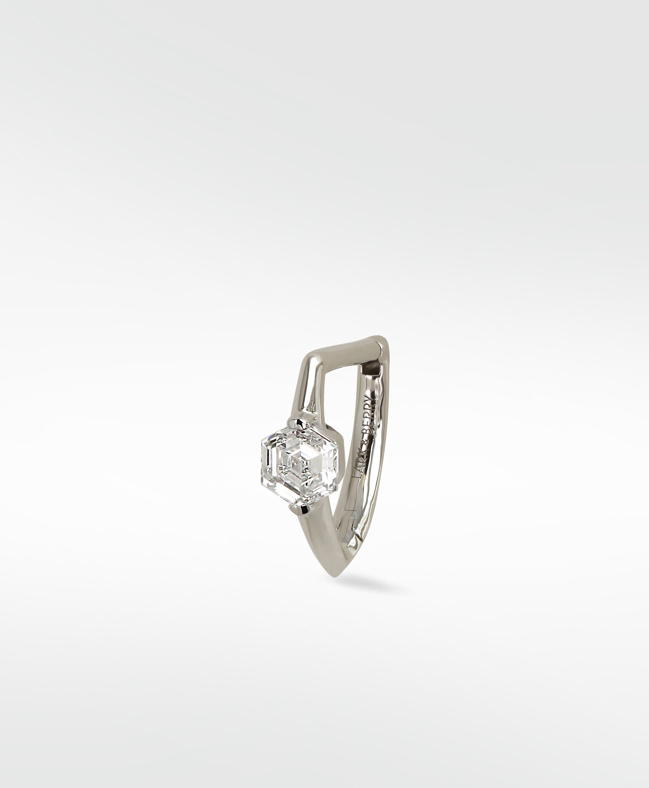 Lark & Berry Modernist hoop earring in 14k white gold with a hexagonal diamond on a knife-edged band.