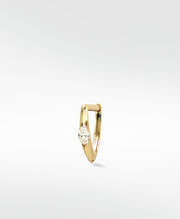 Lark & Berry's knife-edged hoop earring in yellow gold, featuring a striking marquise-cut diamond.